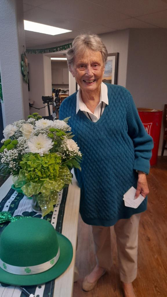 Resident with bouquet Lodi