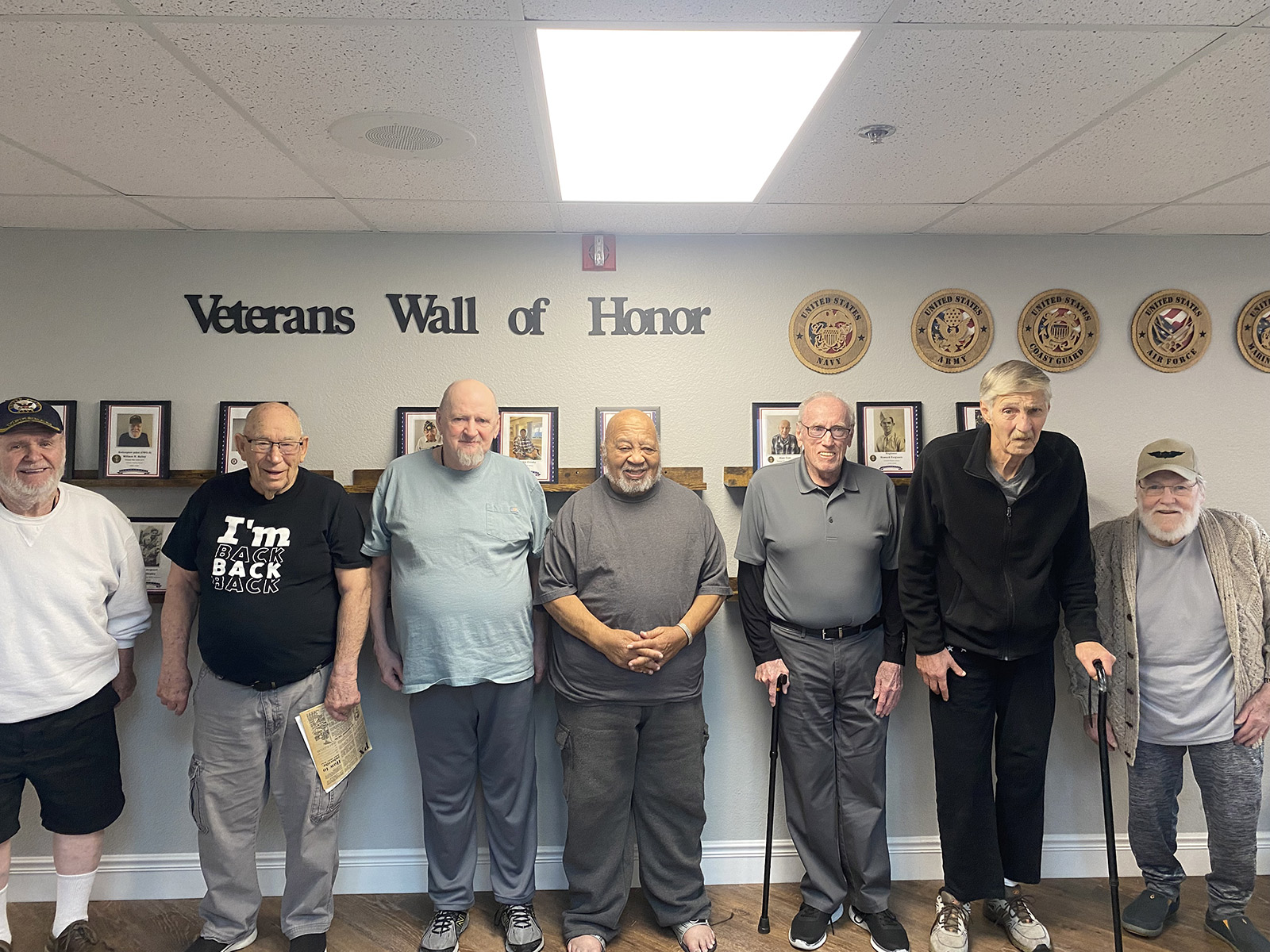 Residents in front of Veterans Wall of Honor Lodi